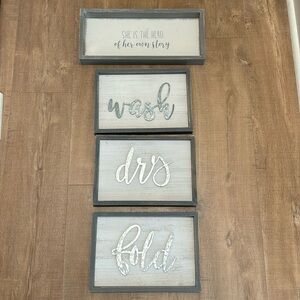 Gray and white wall signs / laundry signs
